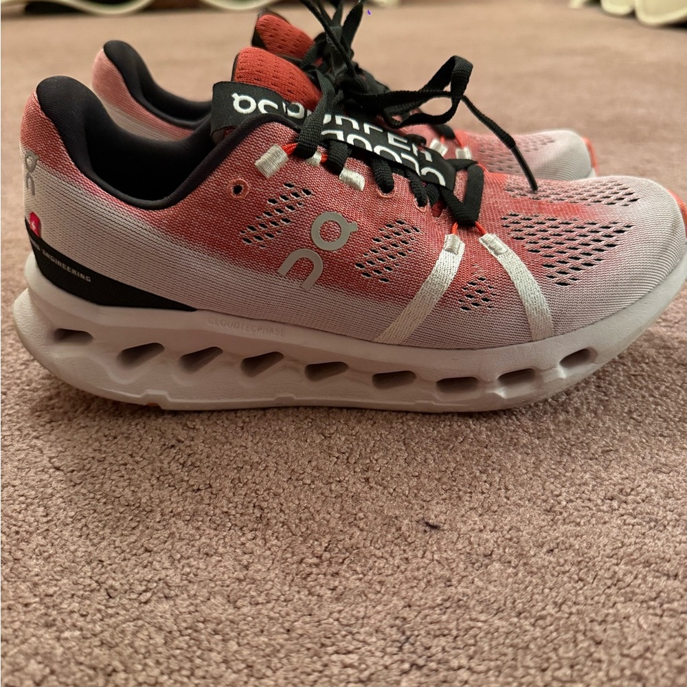 On Running Pink and White Athletic Shoes